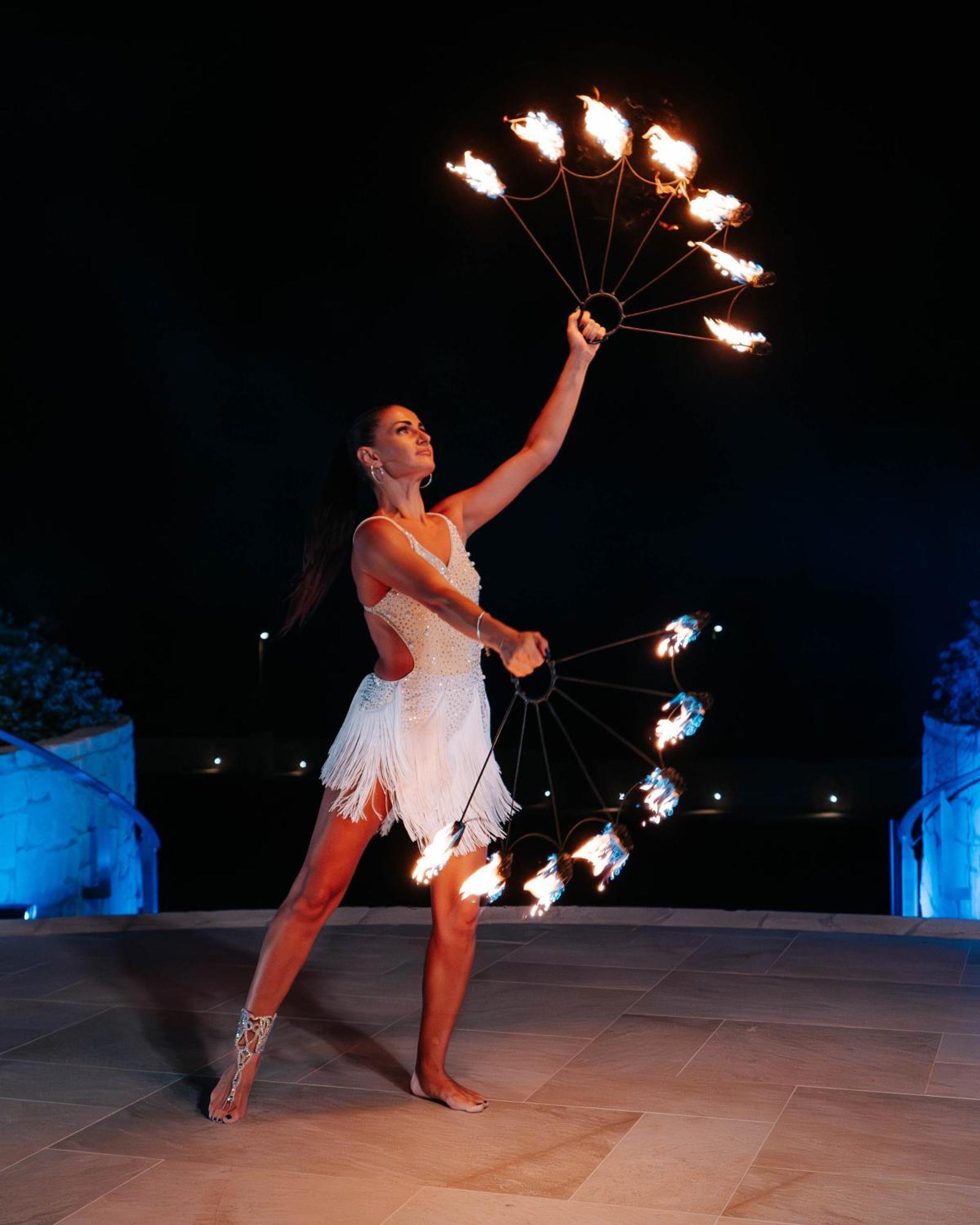 City Of Dreams Mediterranean - Integrated Resort, Casino & Entertainment Limassol Exterior photo A woman performing with a fire fan