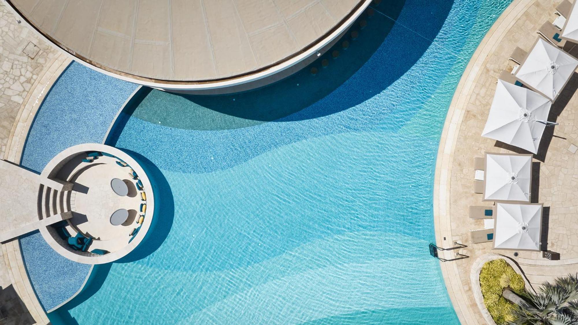 City Of Dreams Mediterranean - Integrated Resort, Casino & Entertainment Limassol Exterior photo Aerial view of the pool