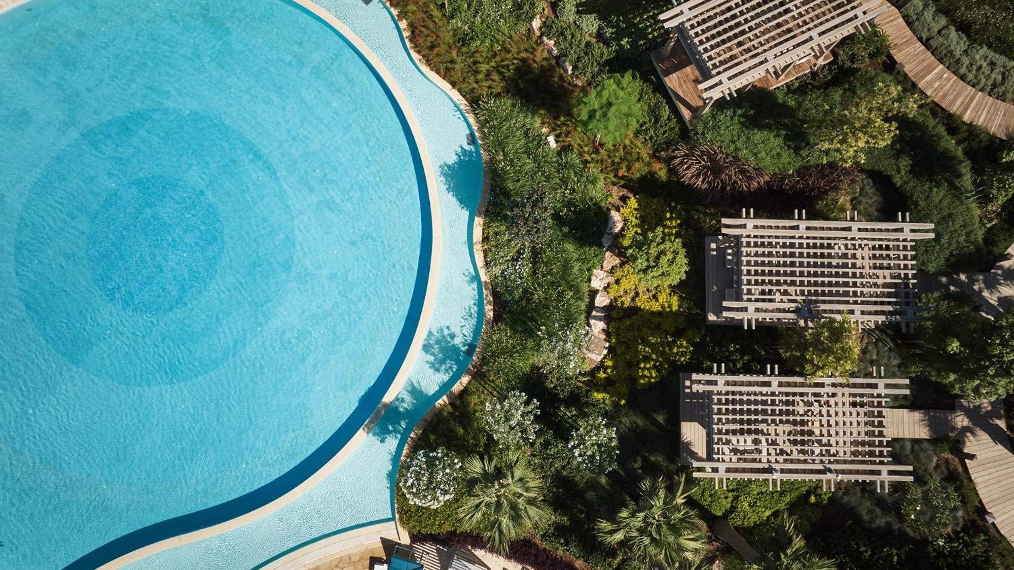 City Of Dreams Mediterranean - Integrated Resort, Casino & Entertainment Limassol Exterior photo Aerial view of the pool